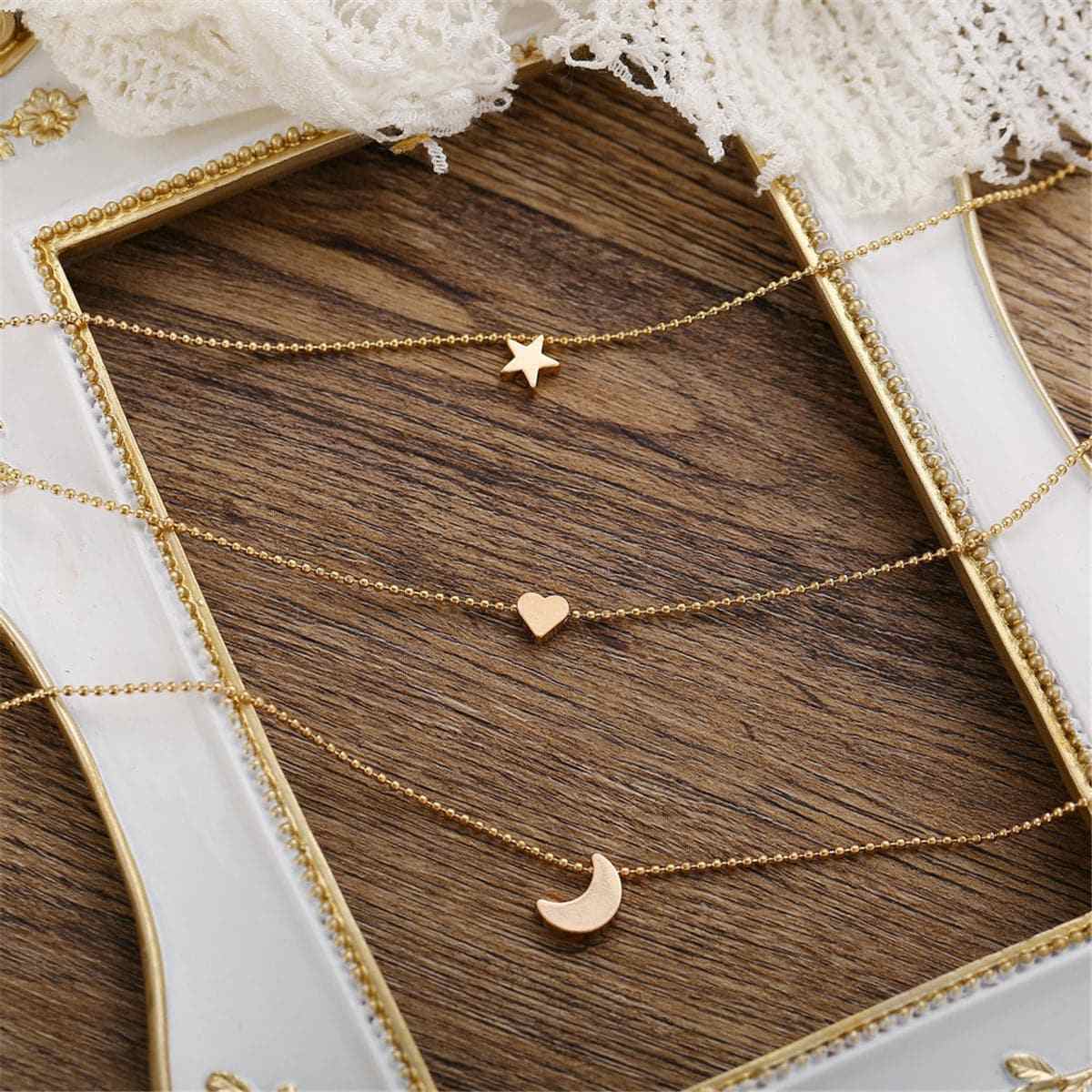 Goldtone Star & Heart Layer Pendant Necklace