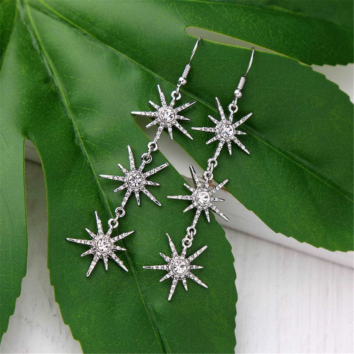 Cubic Zirconia & Silvertone Linking Sun Drop Earrings