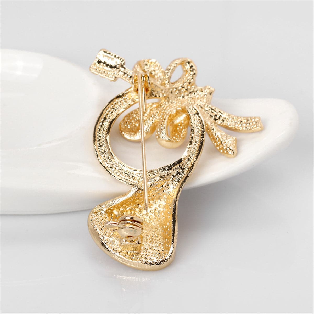 Cubic Zirconia & Goldtone French Horn & Bow Brooch