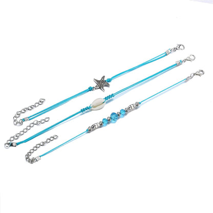 Blue Polyster & Pukka Shell Silvertone Starfish Anklet Set