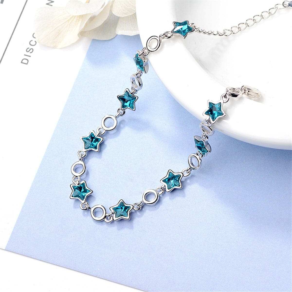 Blue Crystal & Silvertone Star Station Bracelet