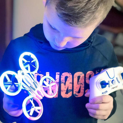 White drone, white remote control, and blue propellers-