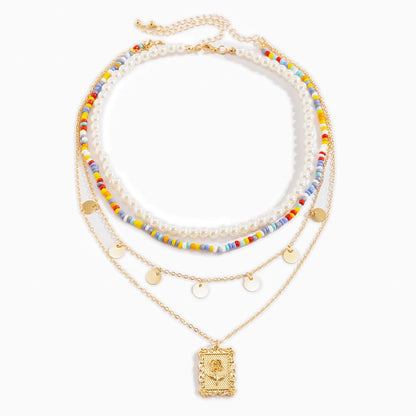 Goldtone Rose Card Pendant Necklace Set
