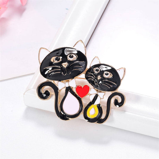 Black Enamel & Goldtone Double-Cat Brooch