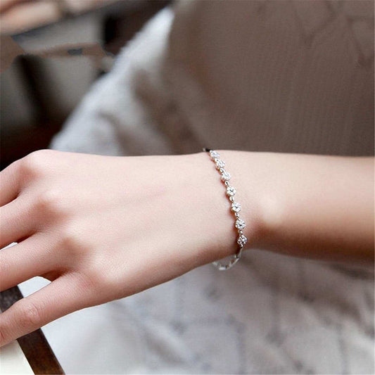 Cubic Zirconia & Silvertone Seven-Flower Bracelet