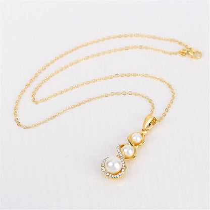 Cubic Zirconia & Pearl Twisted Drop Earrings & Pendant Necklace