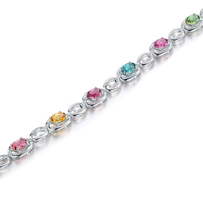 Pink Oval Crystal & Silvertone Station Bracelet