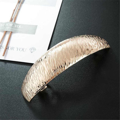 Goldtone Textured Curved Hair Clip