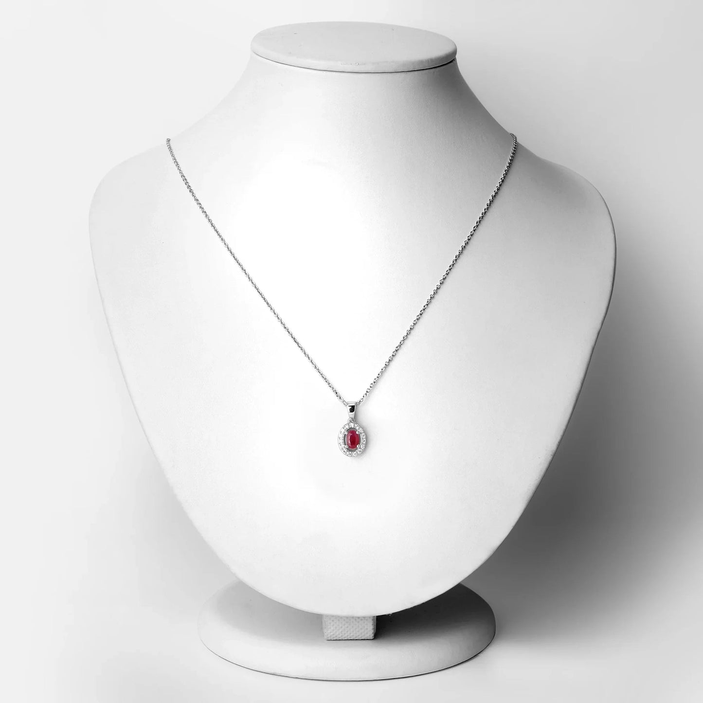 0.52 Ct Oval Pink Ruby and Lab Diamond Prong Silver Halo Pendant Necklace