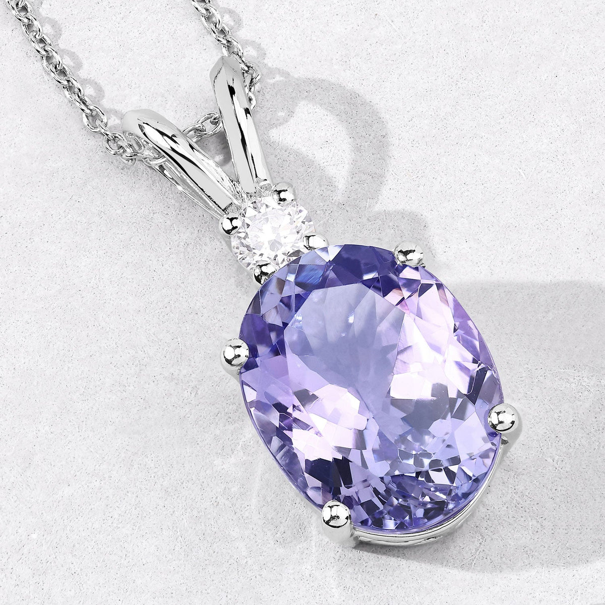 8.40 Cttw Oval Violet Tanzanite and Lab Diamond Rhodium over Silver Solitaire Pendant Necklace