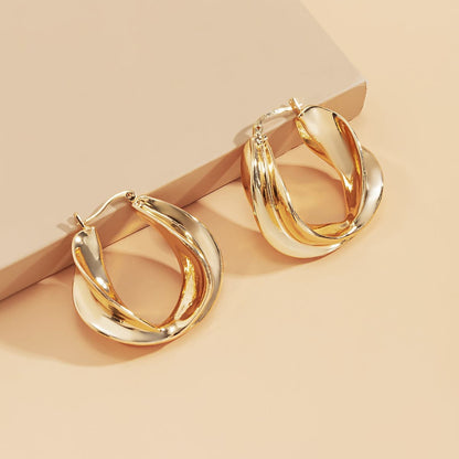 Goldtone Twist Huggie Earrings