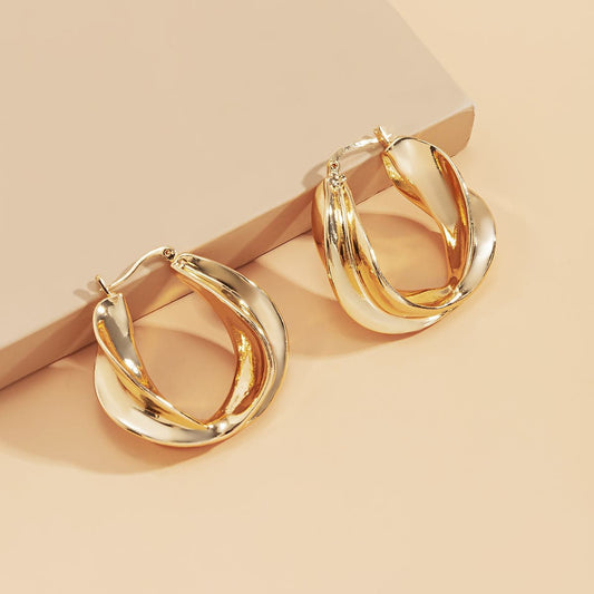 Goldtone Twist Huggie Earrings