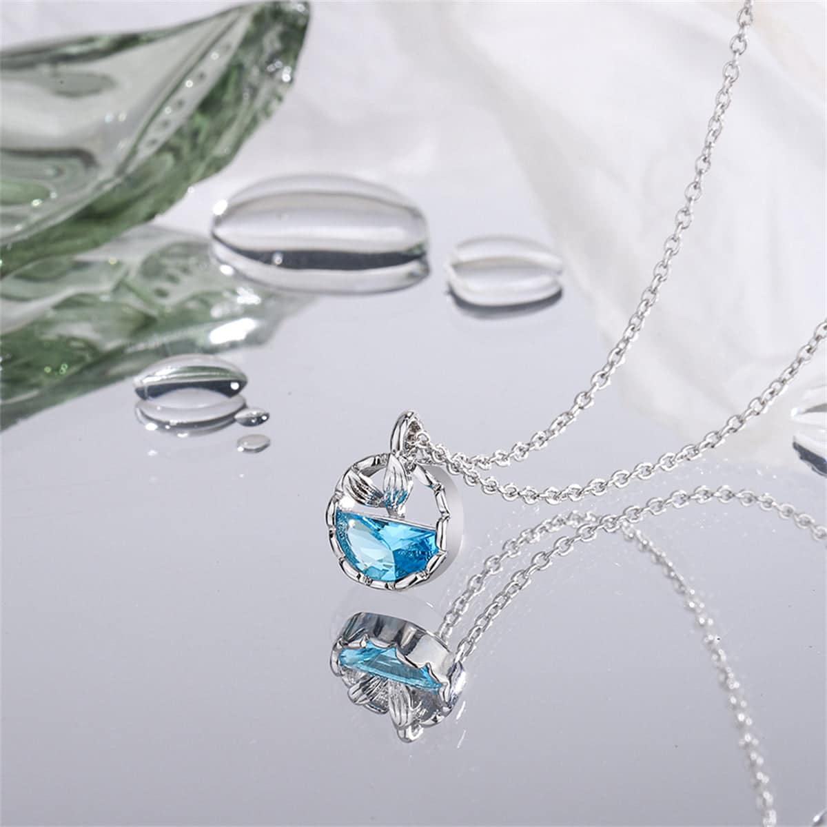 Blue Crystal & Silvertone Circular Fishtail Pendant Necklace
