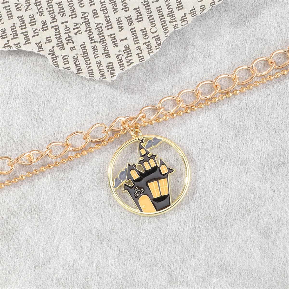 Black Enamel & Goldtone Castle Layered Charm Bracelet