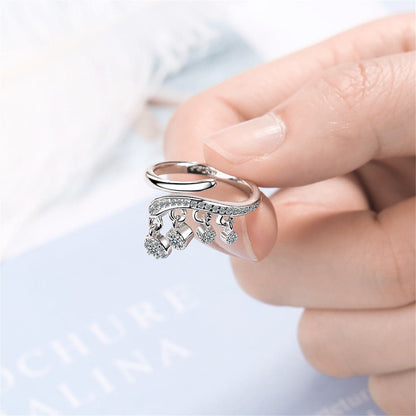 White Cubic Zirconia & Silvertone Tassel Bypass Ring