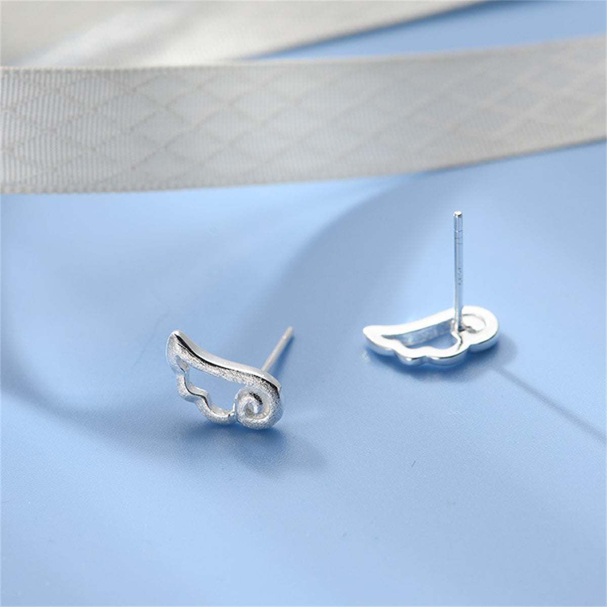 Silvertone Wing Stud Earrings