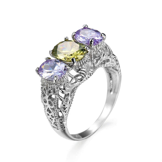 Purple Crystal & Silvertone Triple Oval Filigree Ring
