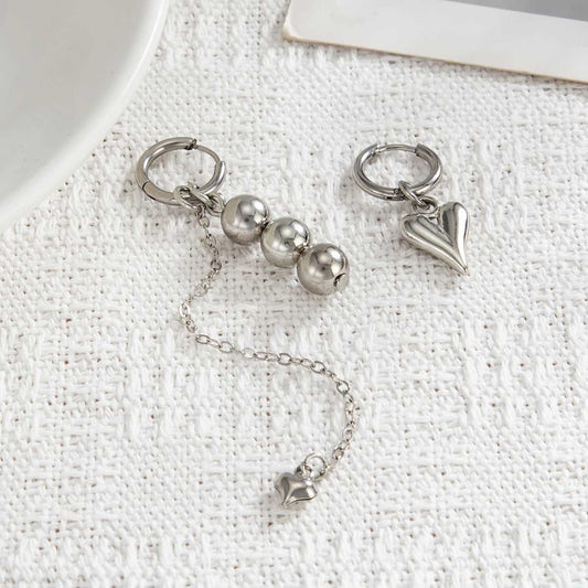 Silvertone Mismatching Beaded Tassel Heart Dangle Earrings