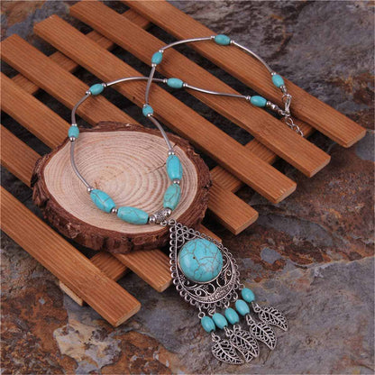 Turquoise & Silvertone Tassel Pendant Necklace