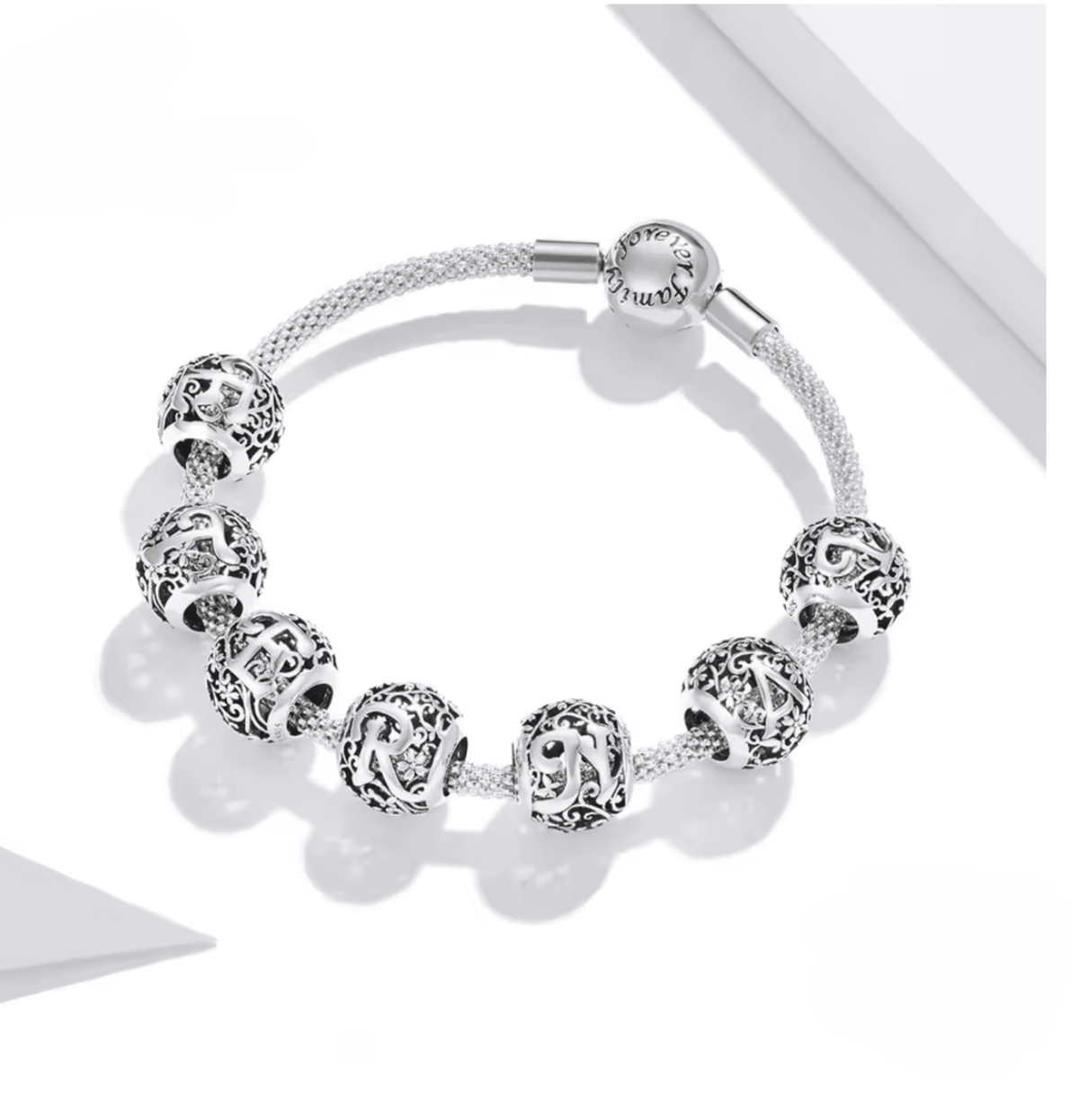Sterling silver round alphabet charm - F