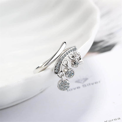 White Cubic Zirconia & Silvertone Tassel Bypass Ring