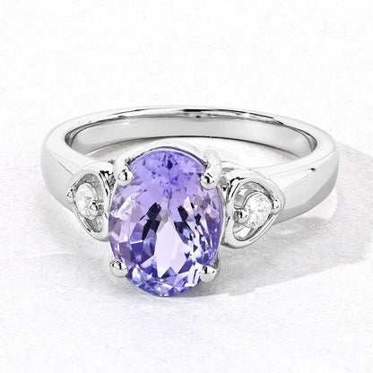 3.23 Cttw Oval Violet Tanzanite and Lab Diamond Rhodium over Silver 3-Stone Ring