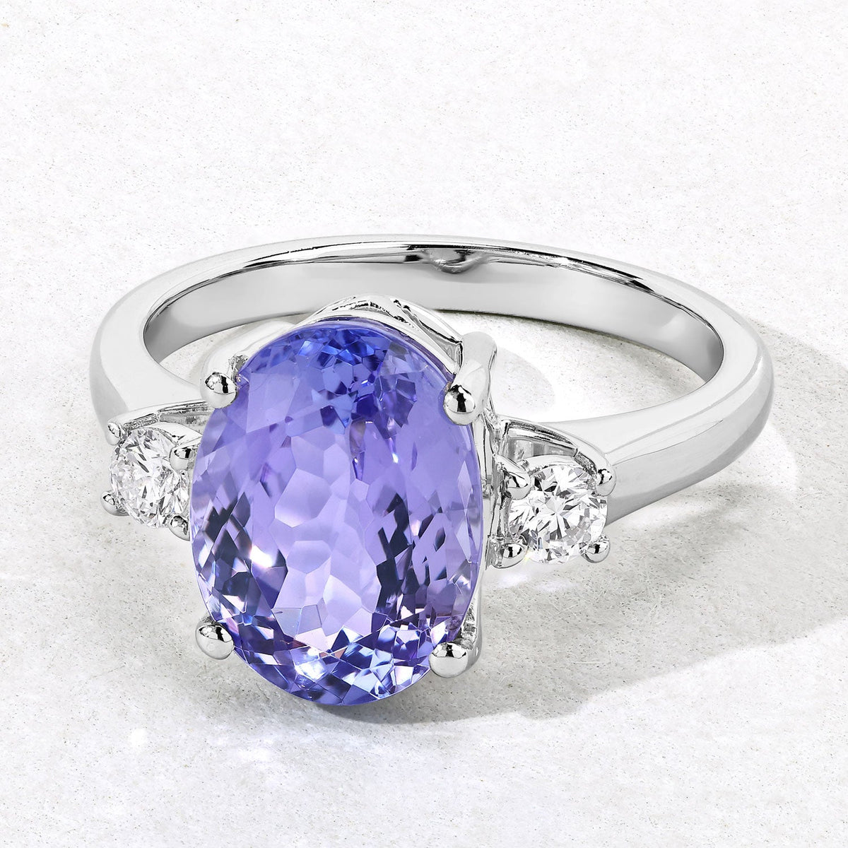 8.01 Cttw Oval Violet Tanzanite and Lab Diamond Rhodium over Silver 3-Stone Ring