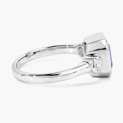 3.49 Cttw Octagon Violet Tanzanite and Lab Diamond Bezel Rhodium over Silver 3-Stone Ring