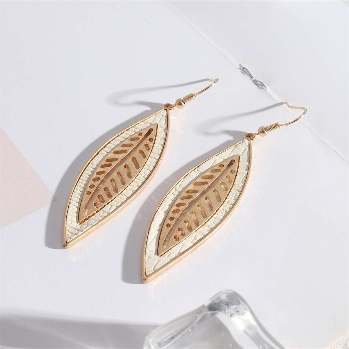 White Polyurethane & Goldtone Weave Leaf Drop Earrings