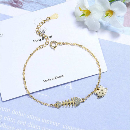 Cubic Zirconia & Goldtone Fishbone & Cat Charm Bracelet