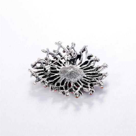 Green Crystal & Silvertone Flower Brooch