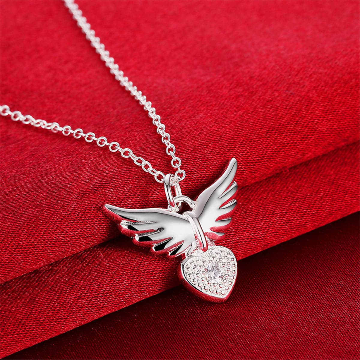 Cubic Zirconia & Silvertone Flying Heart Pendant Necklace