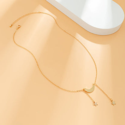 Goldtone Star & Moon Pendant Necklace
