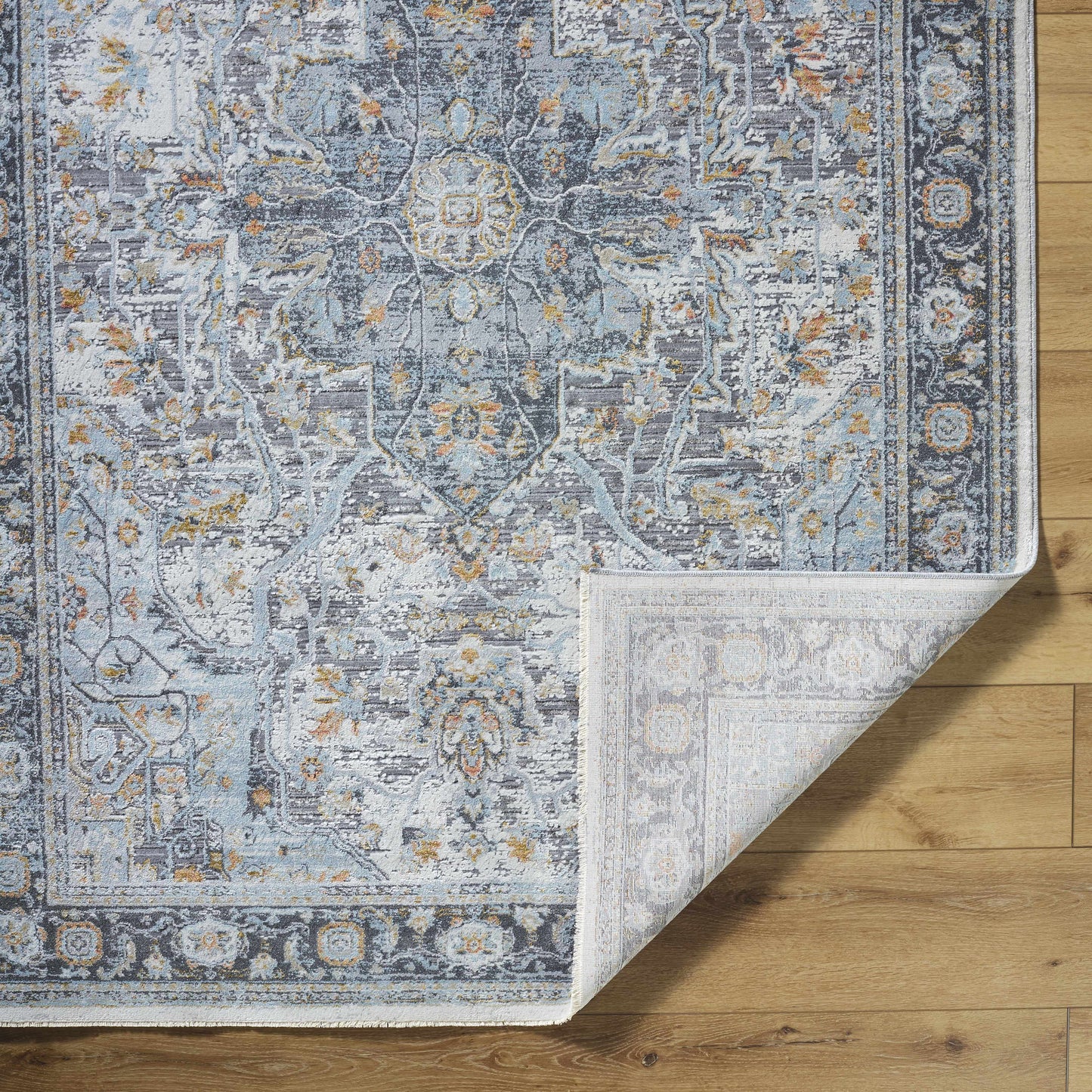 Hovan Area Rug - Clearance