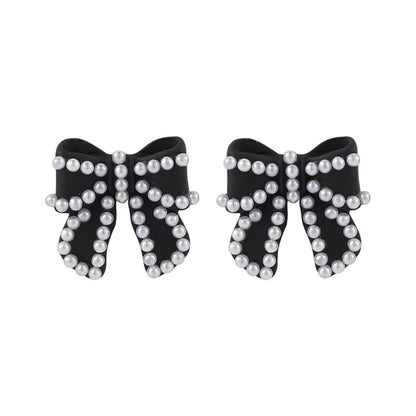 Pearl & Black Enamel Silvertone Bow Stud Earrings