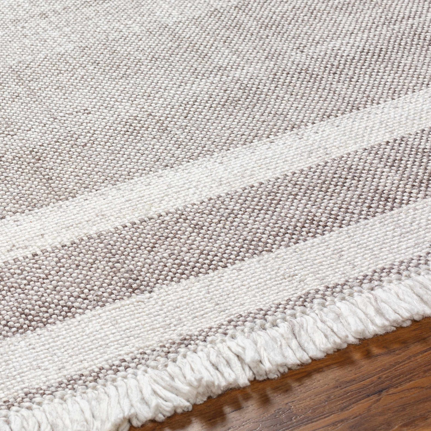 Loic Light Brown Area Rug - Clearance