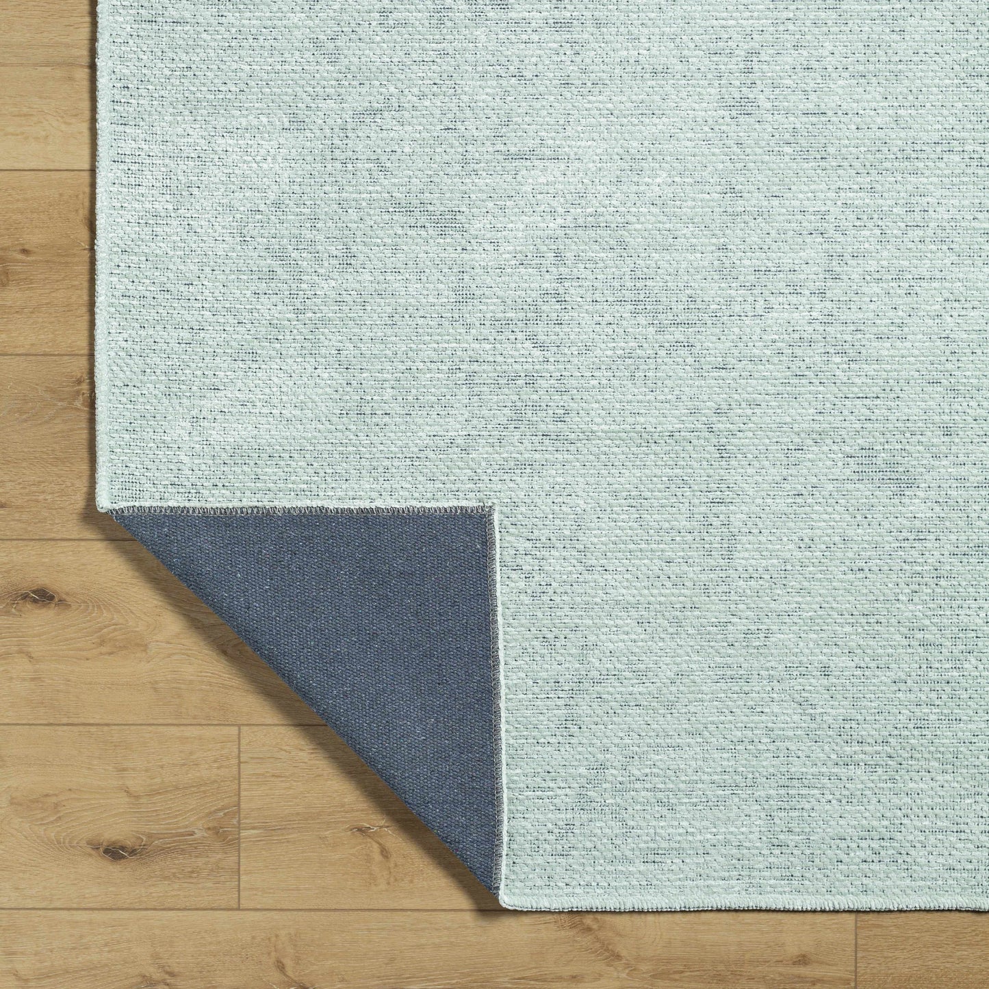 Isako Seafoam Solid Washable Area Rug