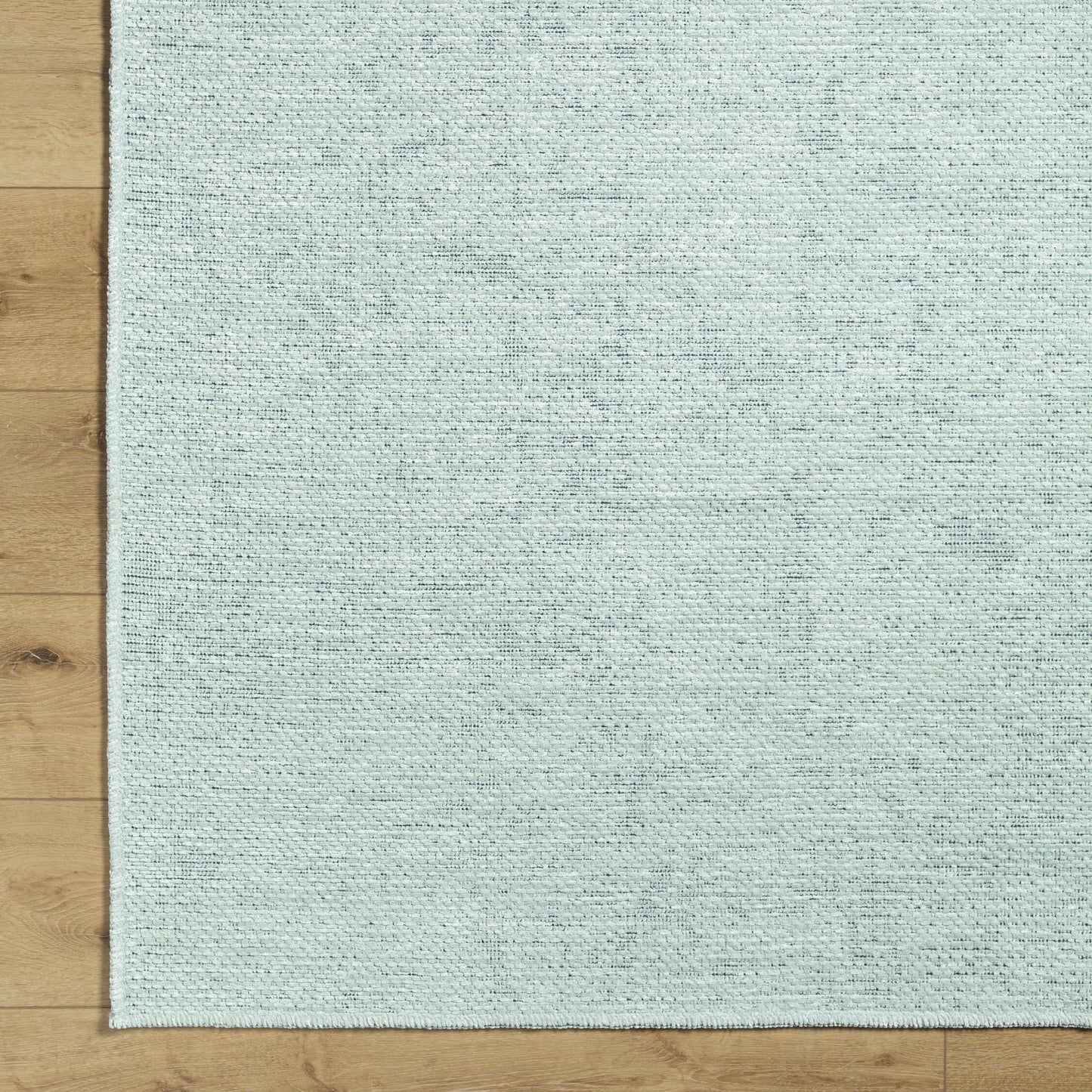 Isako Seafoam Solid Washable Area Rug