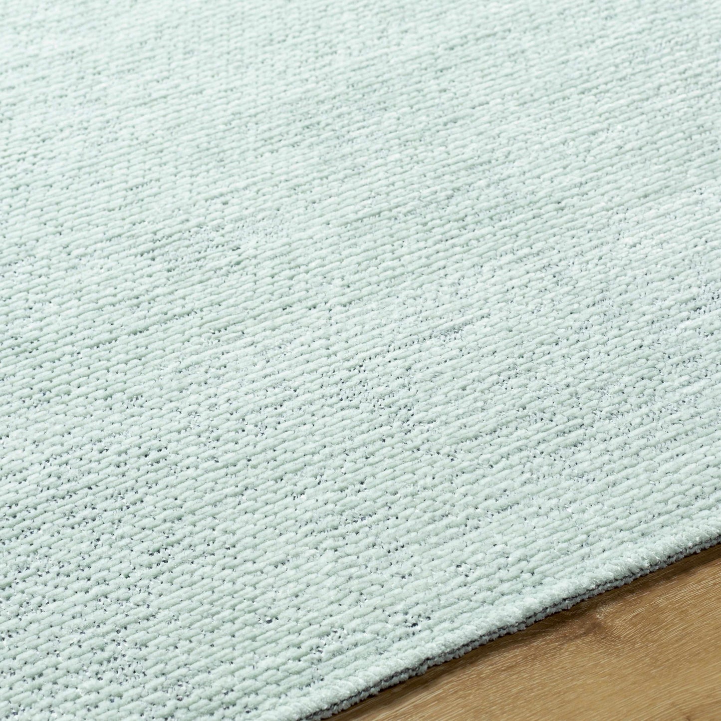 Isako Seafoam Solid Washable Area Rug