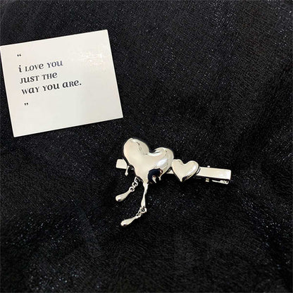 Silvertone Melting Heart Hair Clip