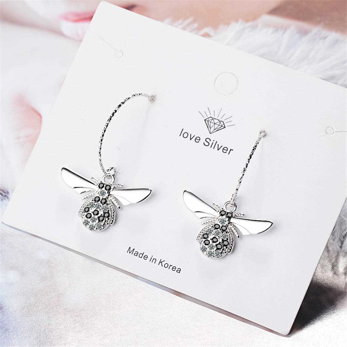 Cubic Zirconia & Silvertone Bee Drop Earrings