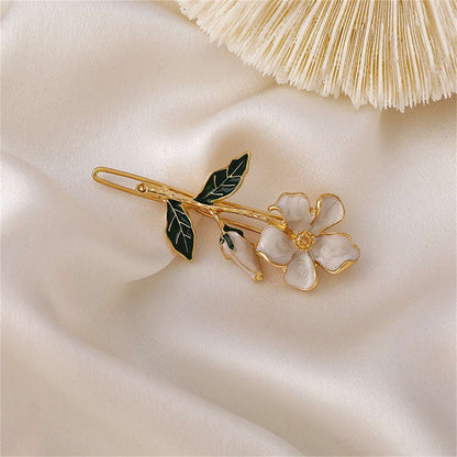 Green Enamel & Goldtone Flower Hair Clip