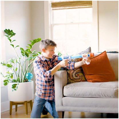 White, blue dart gun and green, blue balls-