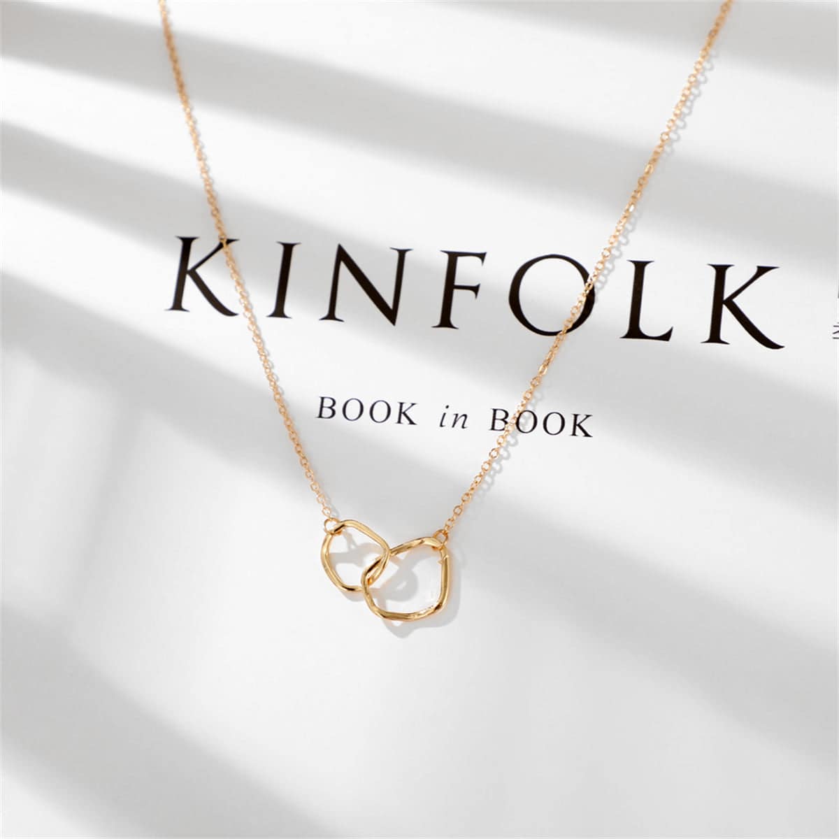 Goldtone Geometric Pendant Necklace