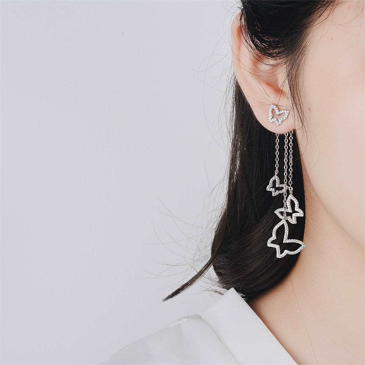 Cubic Zirconia & Silvertone Trio Open Butterfly Drop Earrings