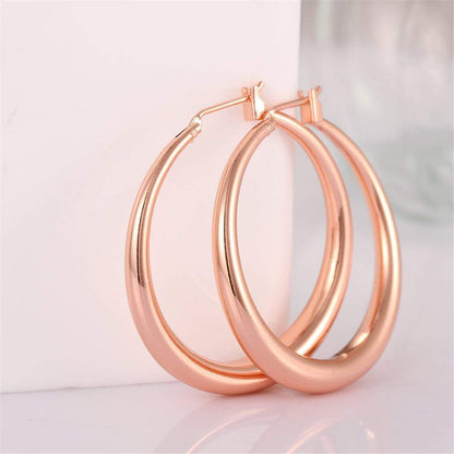 Rose Goldtone Polished Barrel Hoop Earrings