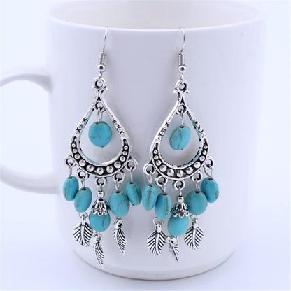 Turquoise & Silvertone Feather Teardrop Earrings