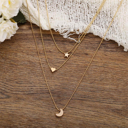 Goldtone Star & Heart Layer Pendant Necklace