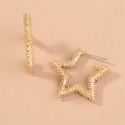 Goldtone Open Star Huggie Earrings