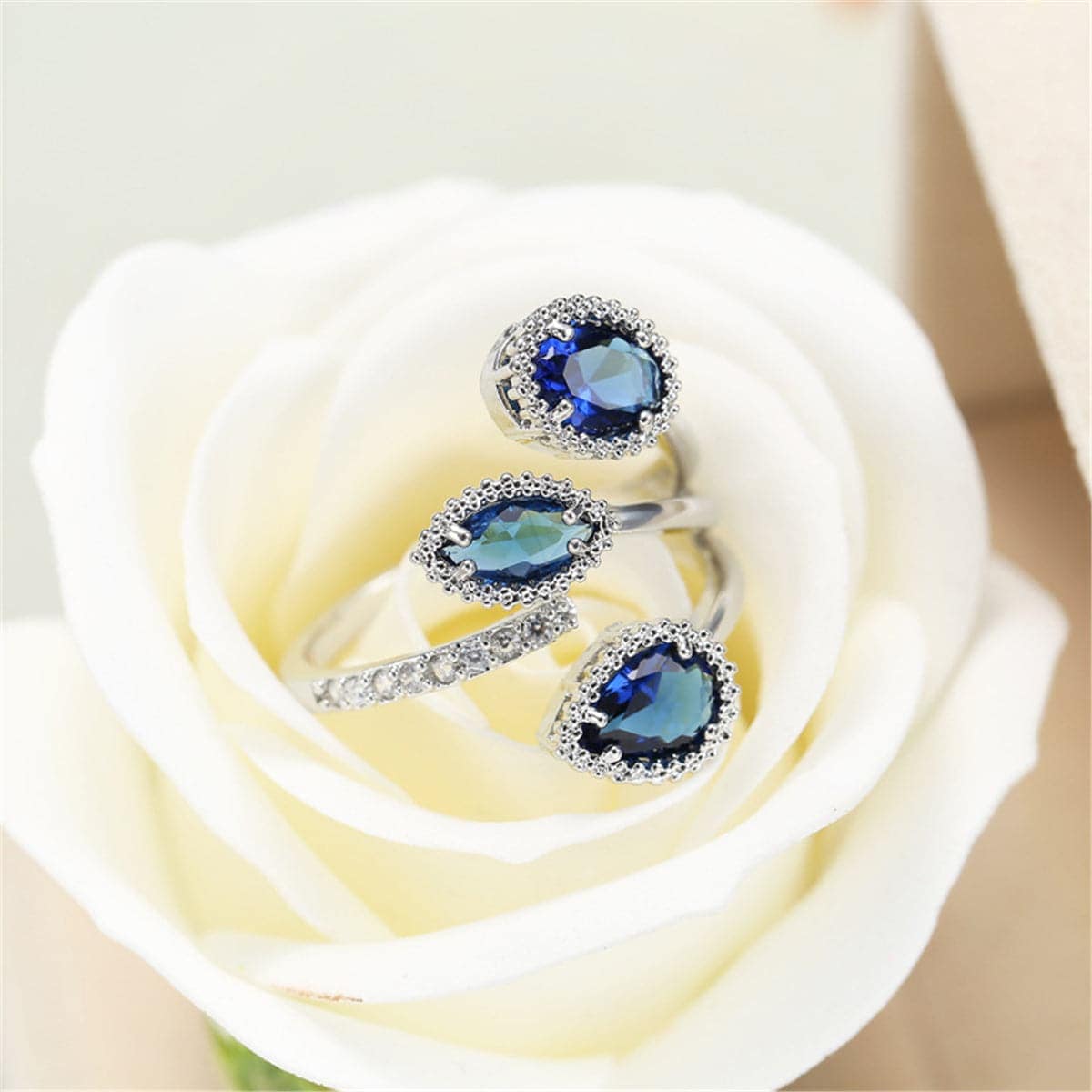 Navy Crystal & Silvertone Rattan Three-Stone Bypass Ring